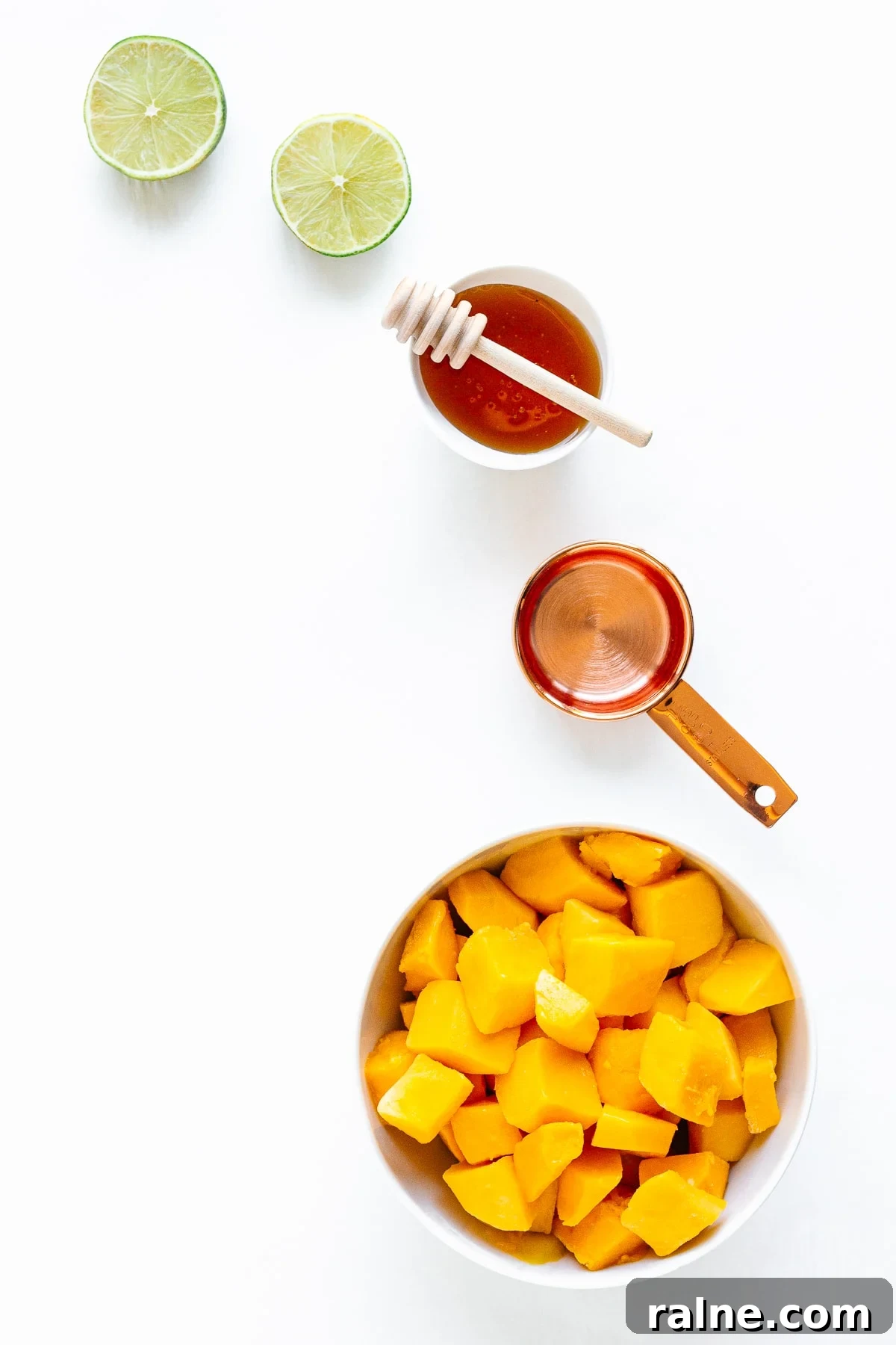 Overhead photo of ingredients needed to make healthy mango popsicles.