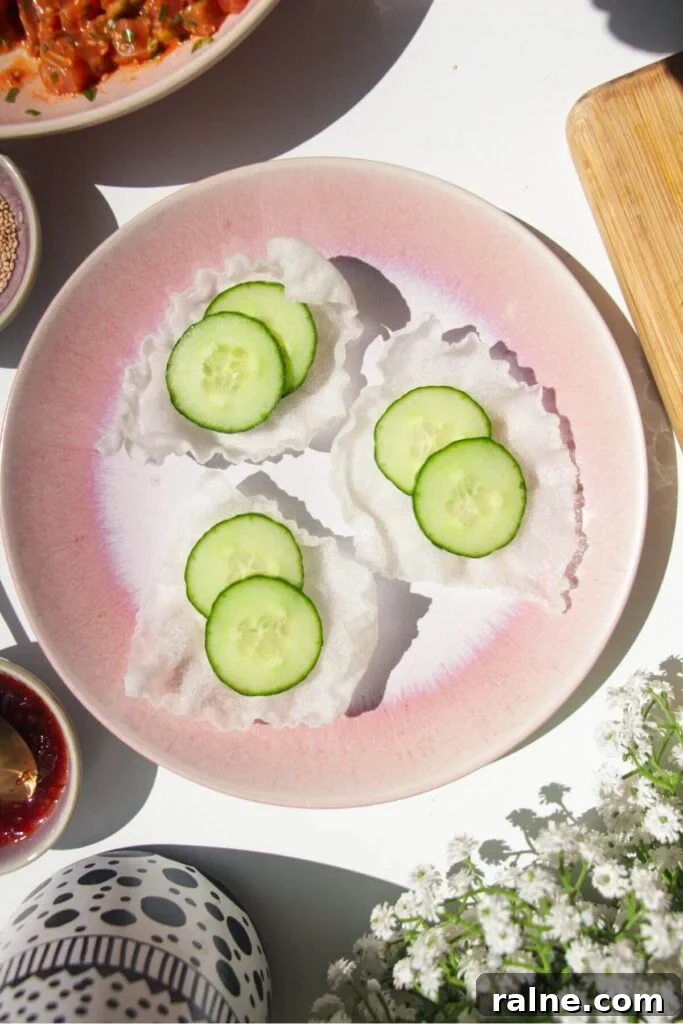 Spicy Tuna Crispy Rice Paper Cups Recipe for Impressing Guests 7 Cucumber slices in crispy rice paper cups.