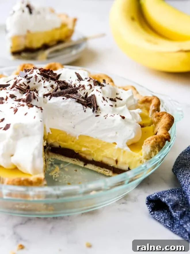 Top Pie-Making Tools Every Baker Should Own 16 chocolate banana cream pie with slice taken out of it so you can see all the layers