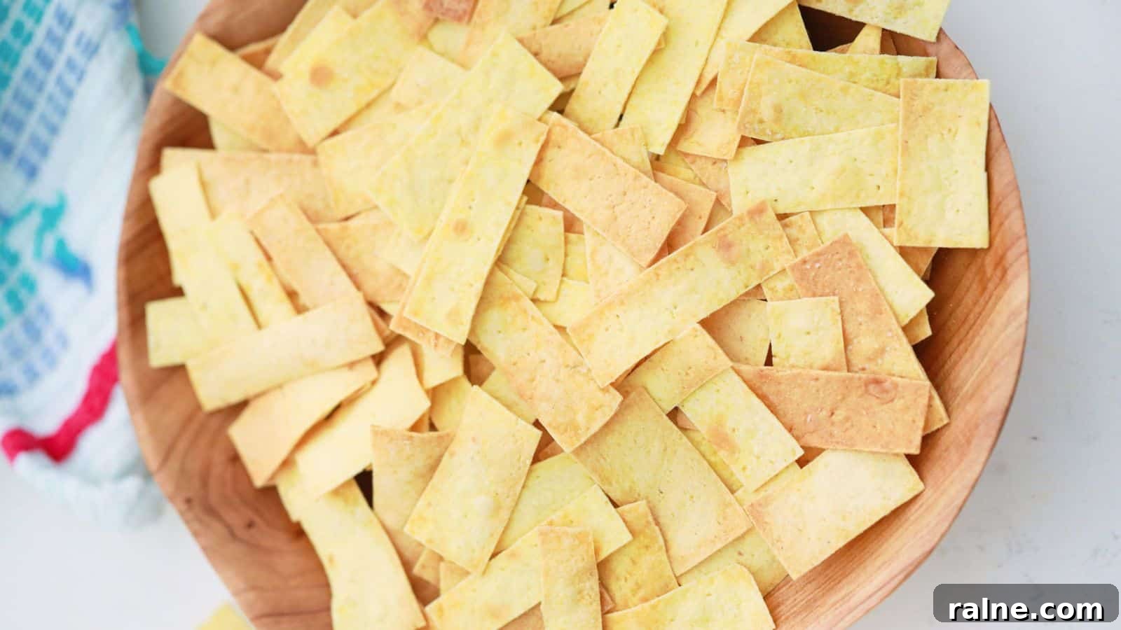 9 Simple Appetizers You Can Make With Just a Few Ingredients 2 Tortilla strips in wooden bowl.