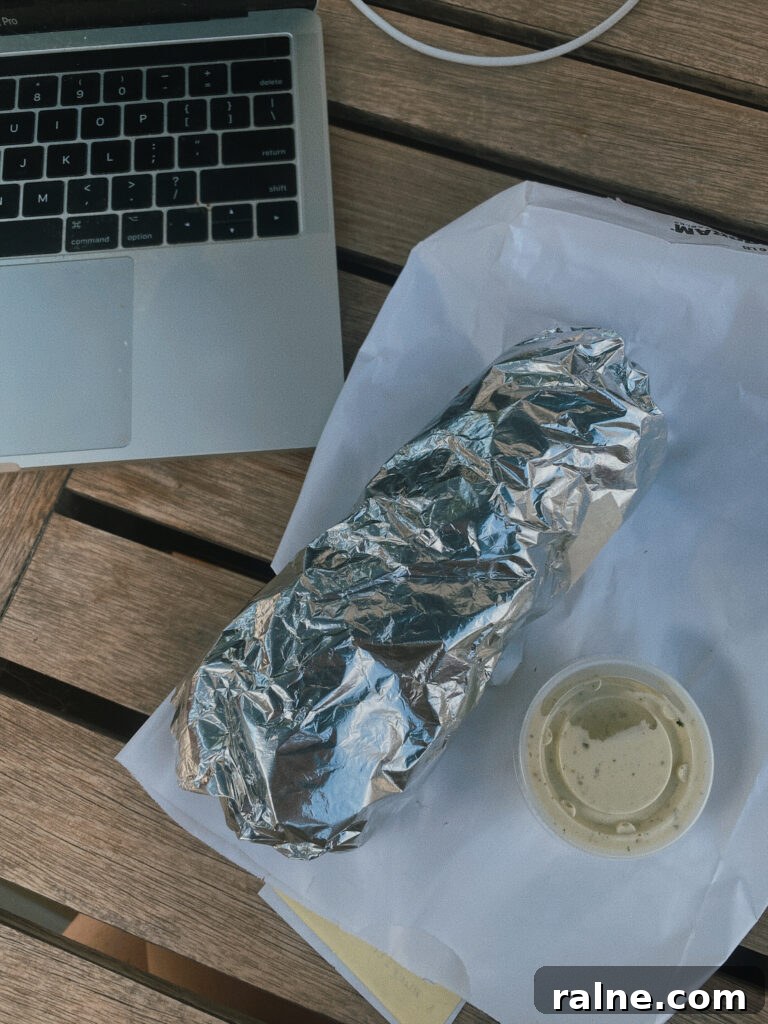Skiers' Breakfast Burrito at Beaumont Bakery: Hearty Mountain Start 2 breakfast burrito in tinfoil