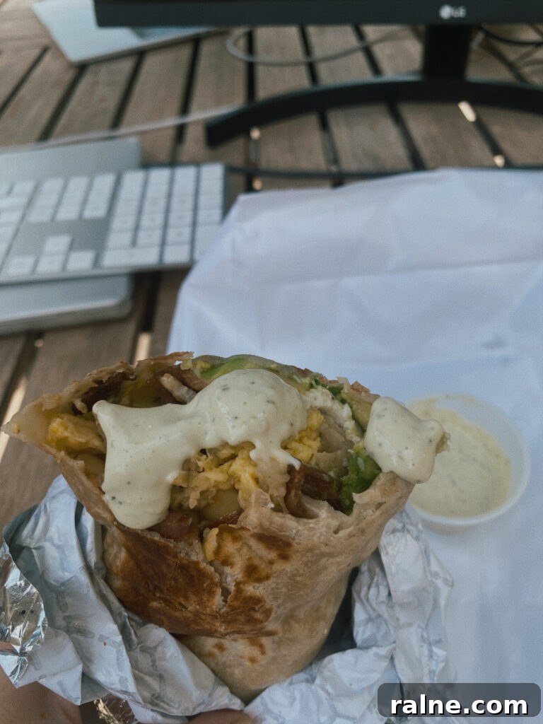 Skiers' Breakfast Burrito at Beaumont Bakery: Hearty Mountain Start 4 Breakfast burrito with sauce