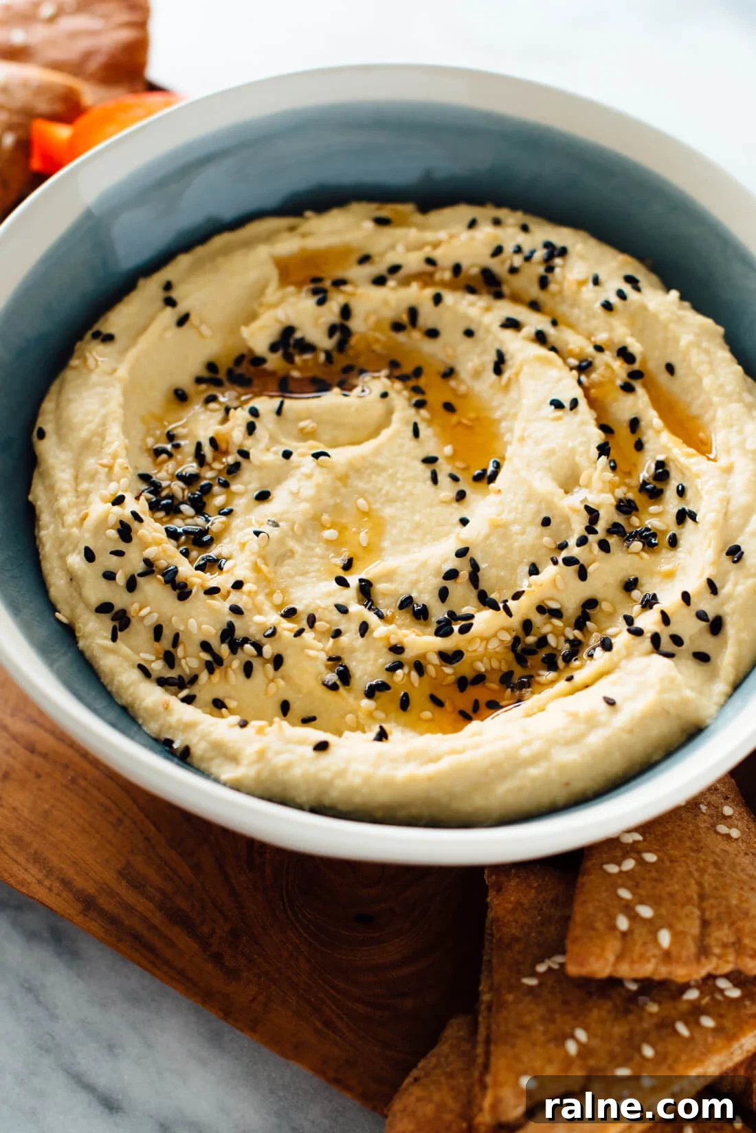 Toasted Sesame Hummus Recipe: Creamy Tahini-Infused Dip 6 Ultra creamy hummus recipe with toasted sesame oil for extra sesame flavor!