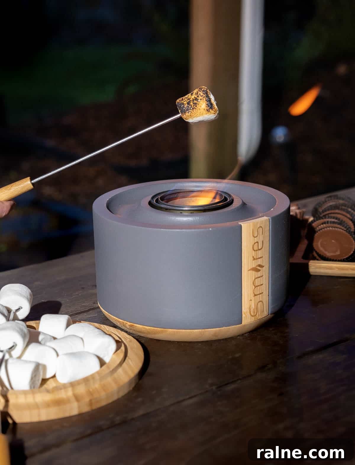 Solo Stove S'mores Bowl Review – Indoor S'mores Kit Guide 4 Terraflame S'mores kit with flame going and marshmallow being cooked.