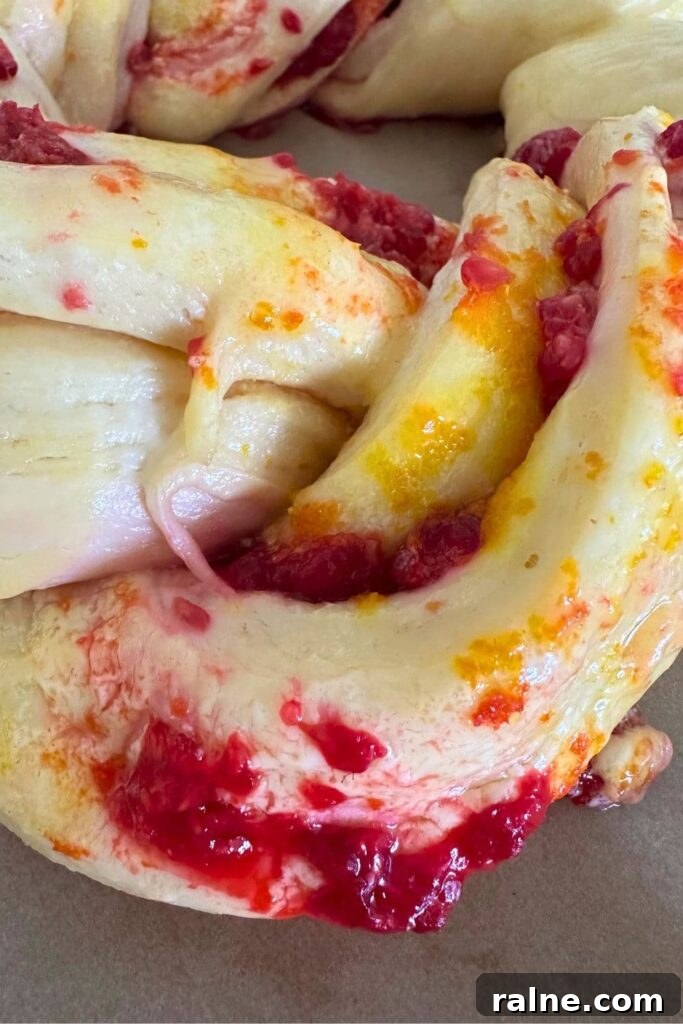 Festive Braided Sourdough Brioche Wreath with Raspberries & Orange Glaze 10 img 28162 10