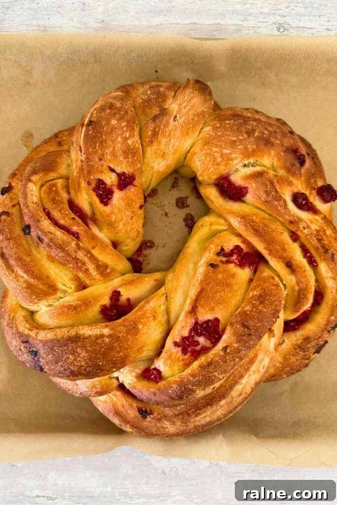 Festive Braided Sourdough Brioche Wreath with Raspberries & Orange Glaze 8 img 28162 8