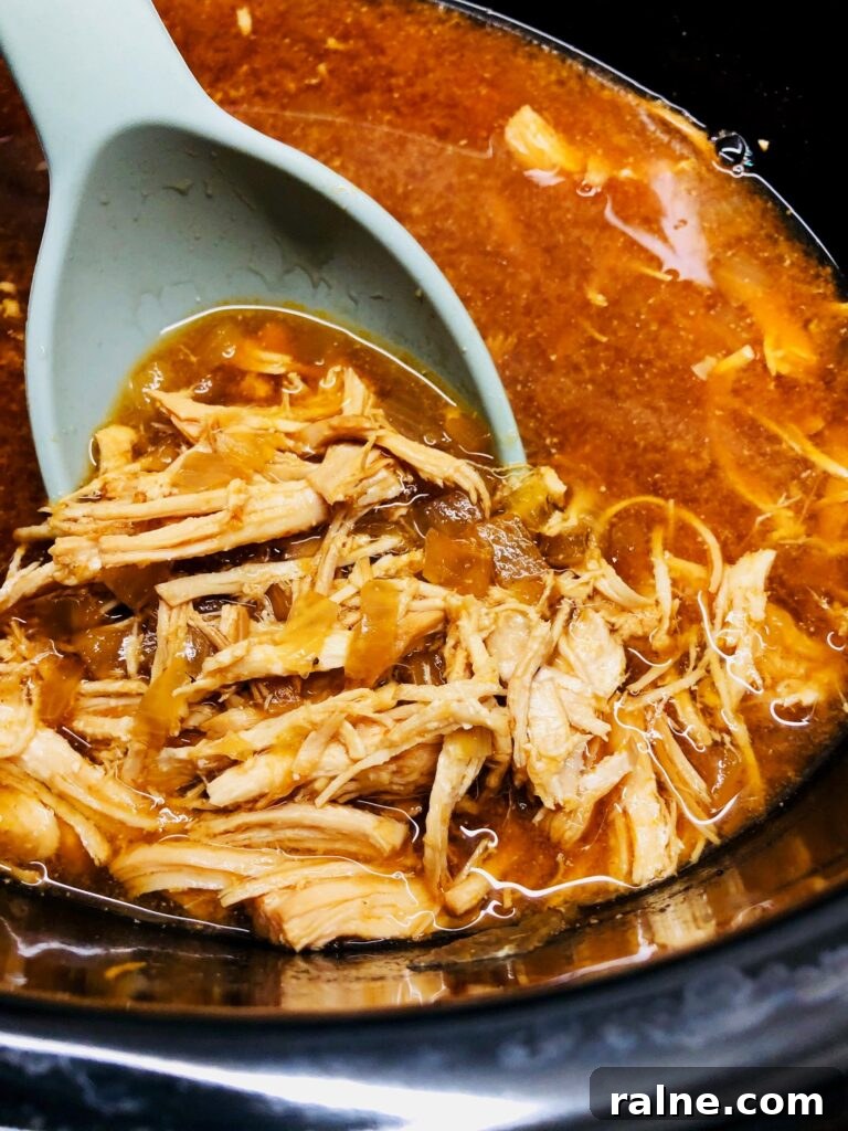 Sriracha Chicken Noodle Soup Made in the Slow Cooker 4 shredded chicken in slow cooker