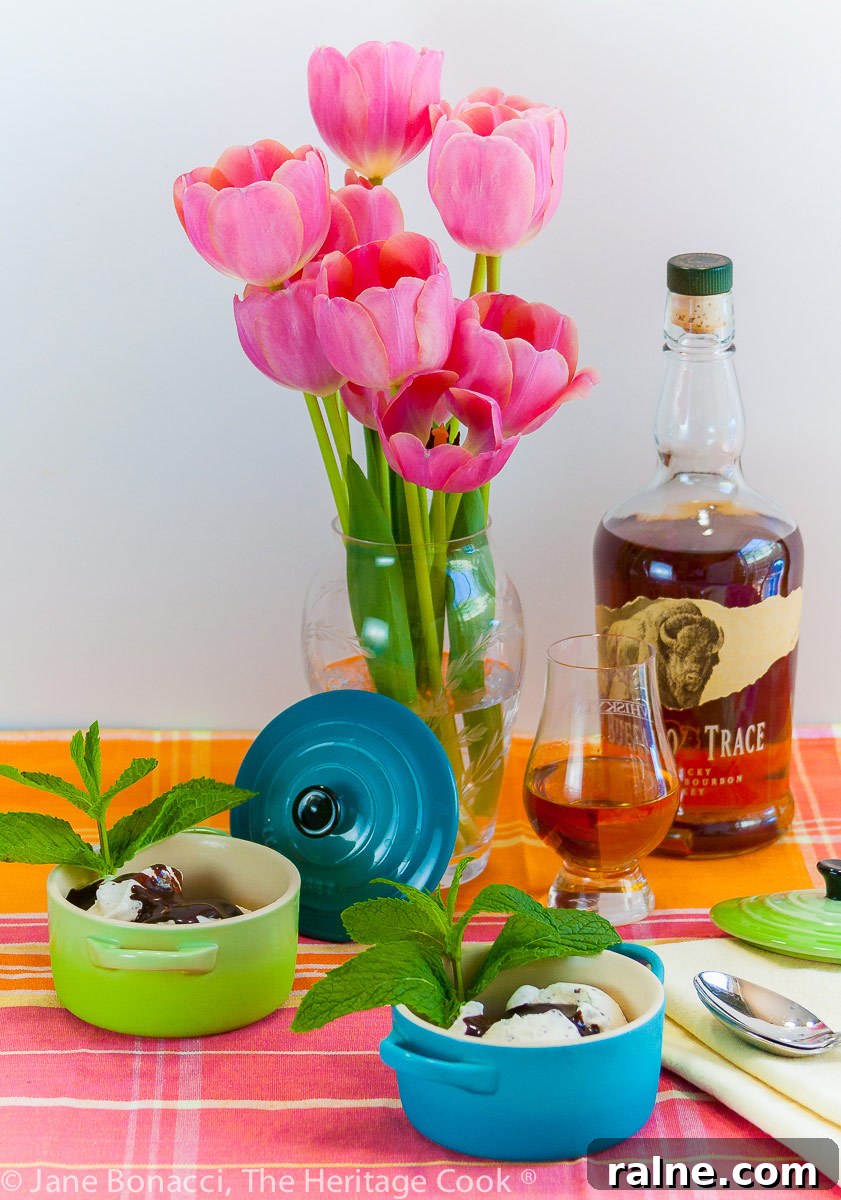 Derby Sundaes with Chocolate Bourbon Sauce 6 Derby Sundaes with Chocolate Bourbon Sauce, tulips in a vase, glass of bourbon in front of the full bottle