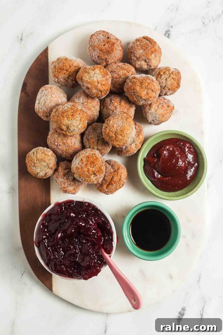 Spicy 4-Ingredient Cranberry Meatballs (Slow Cooker) 4 Ingredients for making slow cooker turkey cranberry meatballs with gochujang chili saice.