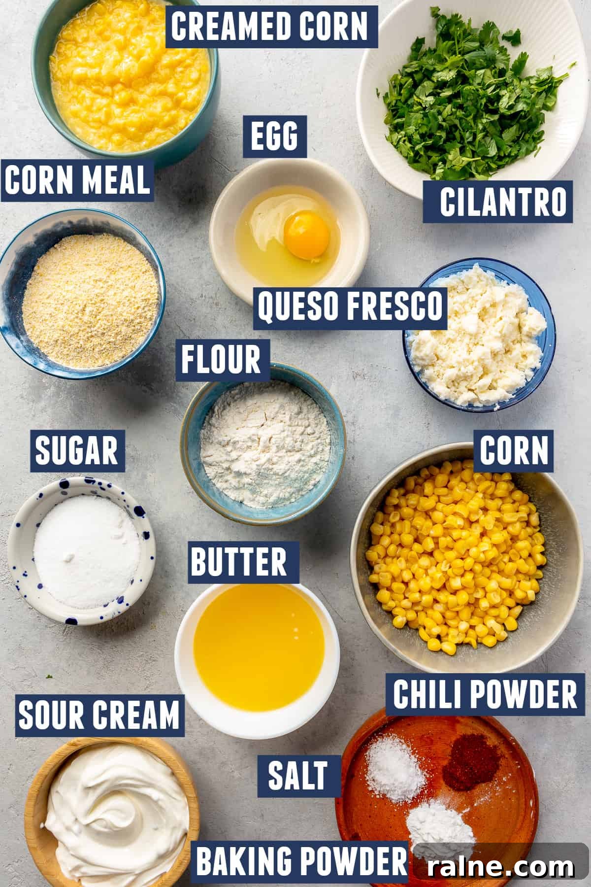 Creamy Mexican Corn Casserole with Cheesy Jalapeño Bake 3 Ingredients needed to make Mexican corn casserole laid on the counter.