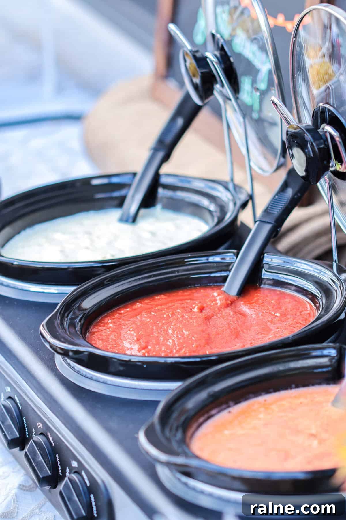 Party Pasta Bar Ideas: How to Set Up a Crowd-Pleasing Pasta Station 10 Pasta bar sauces in crock pots.