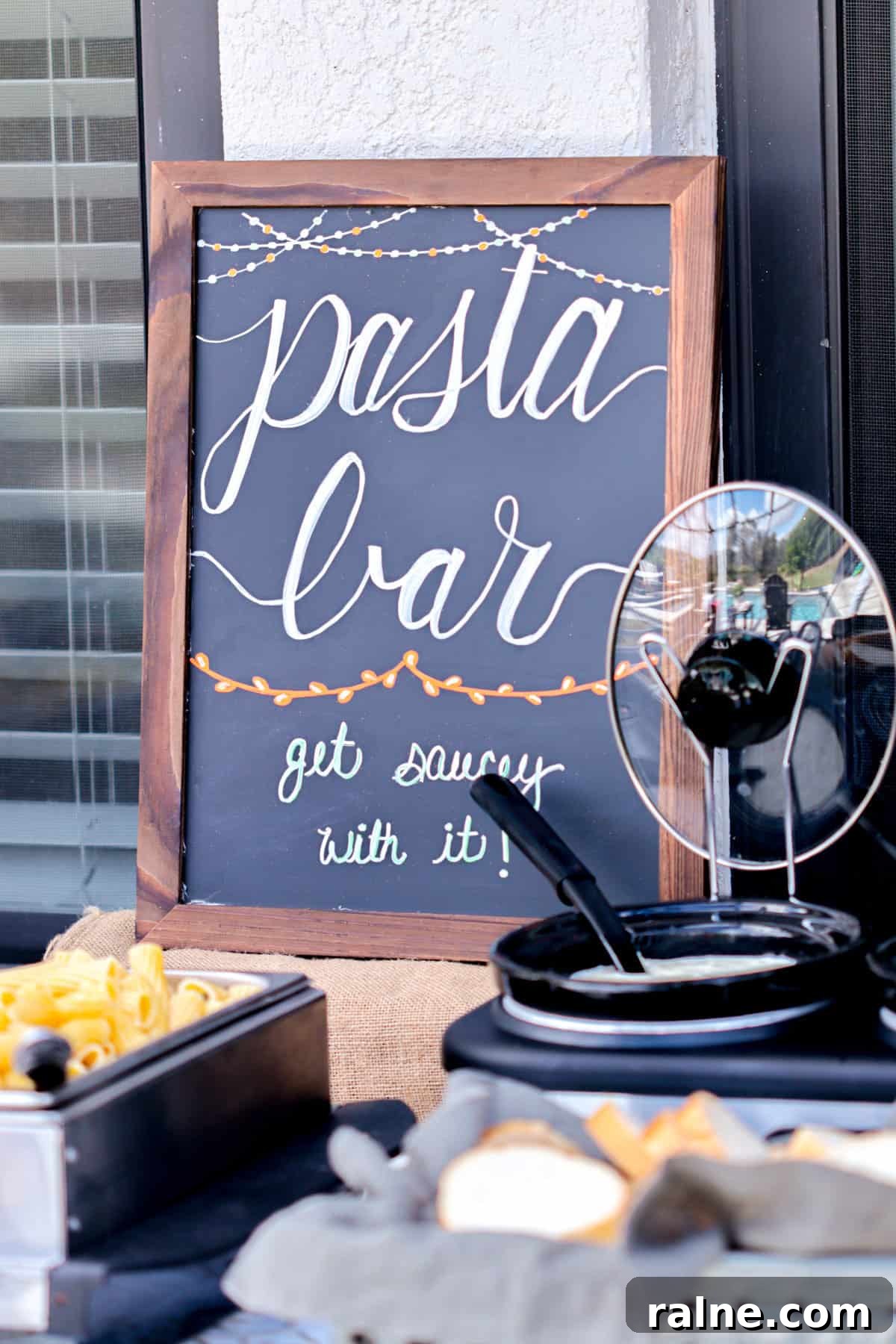 Party Pasta Bar Ideas: How to Set Up a Crowd-Pleasing Pasta Station 12 Pasta bar sign on table.