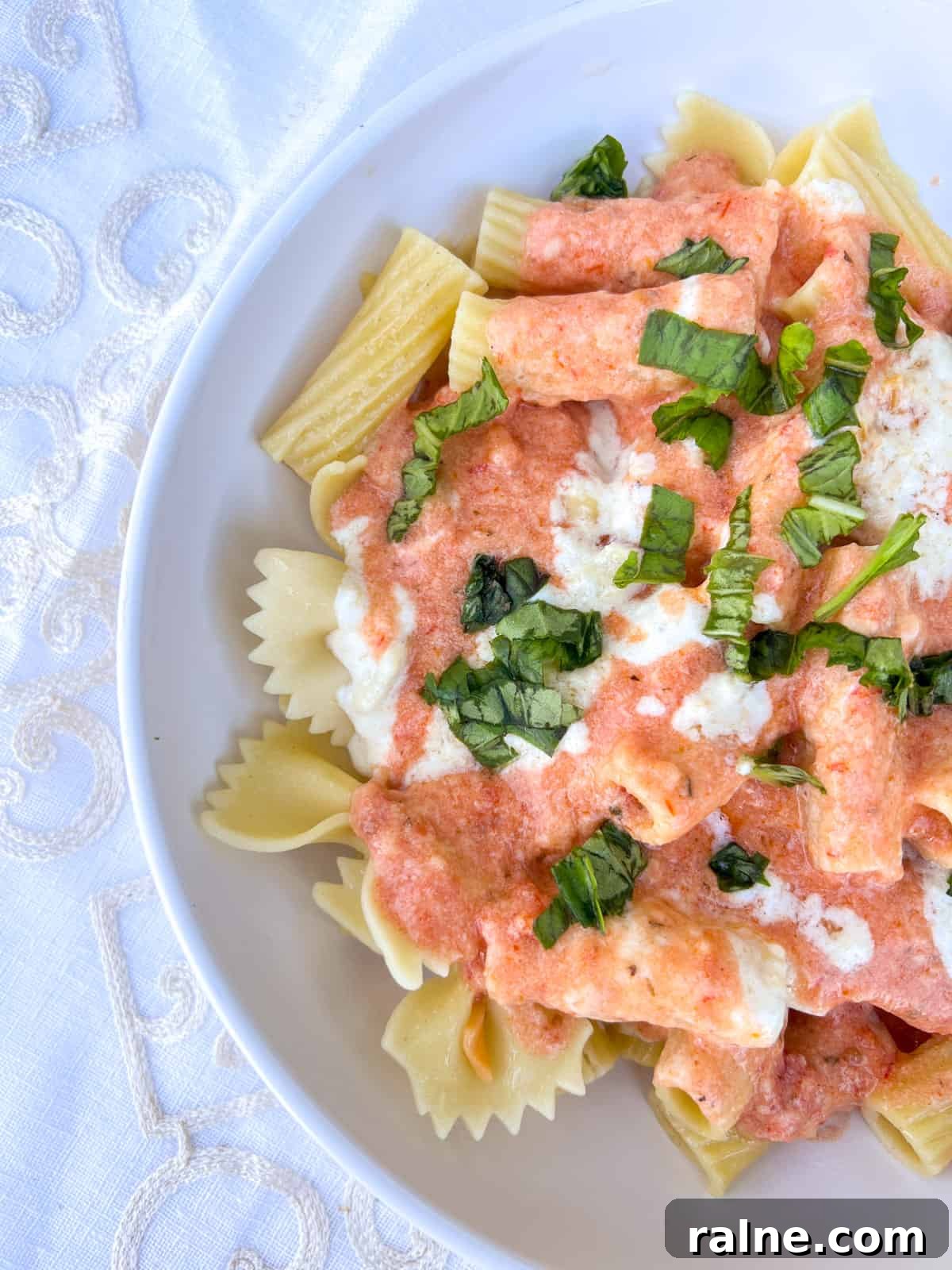Party Pasta Bar Ideas: How to Set Up a Crowd-Pleasing Pasta Station 13 Rigatoni with sauces and basil.