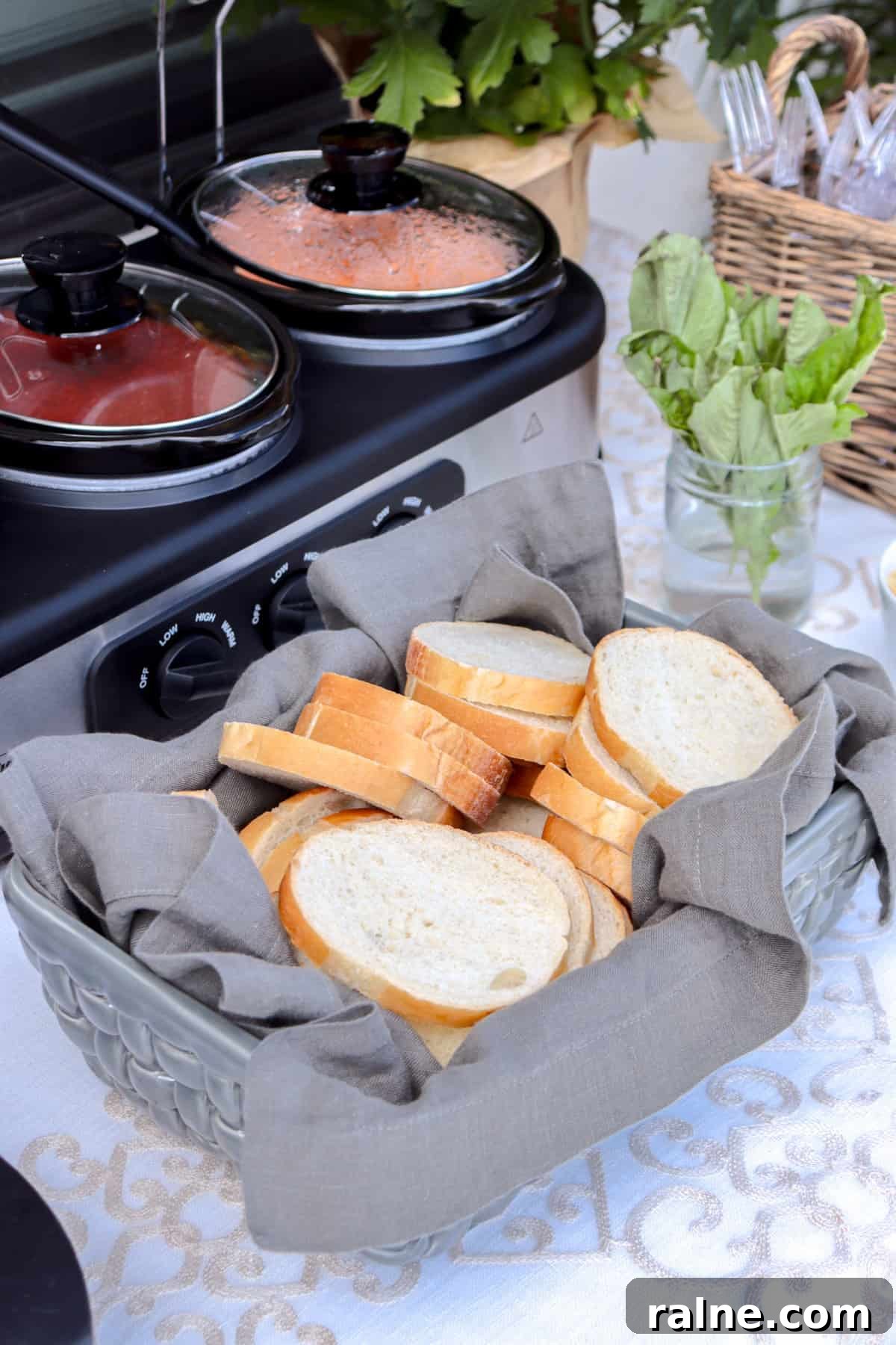 Party Pasta Bar Ideas: How to Set Up a Crowd-Pleasing Pasta Station 5 Bread and pasta sauces on table.