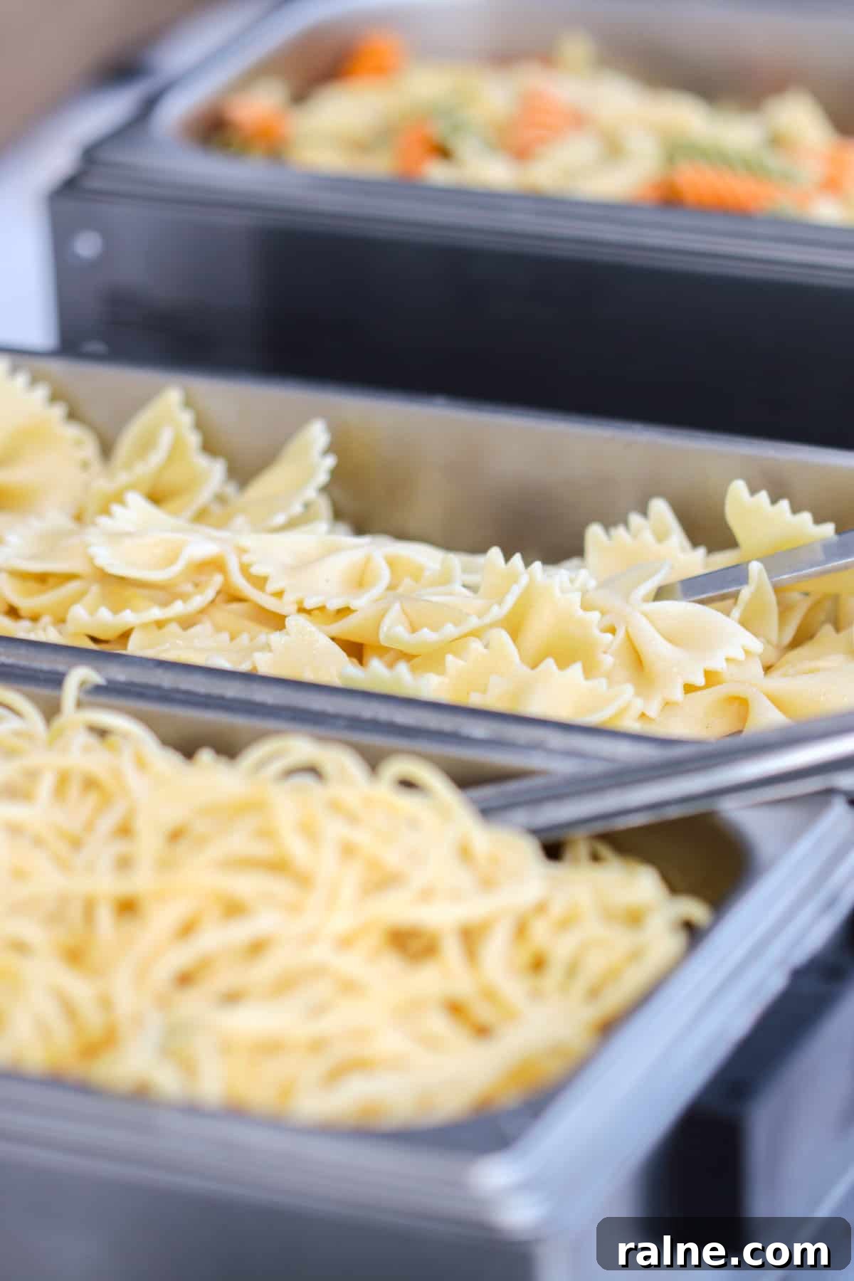 Party Pasta Bar Ideas: How to Set Up a Crowd-Pleasing Pasta Station 8 Close up of pasta at pasta bar.
