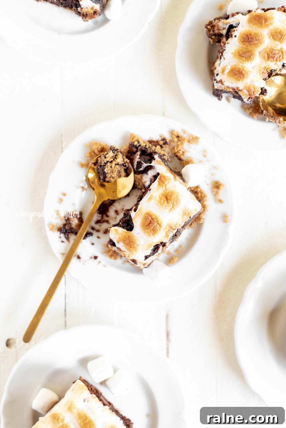 Layered S'mores Brownies Recipe: Gooey Graham, Chocolate & Marshmallow 4 Classic S'mores Brownies with graham cracker crust | All Images © Beyond the Butter, LLC