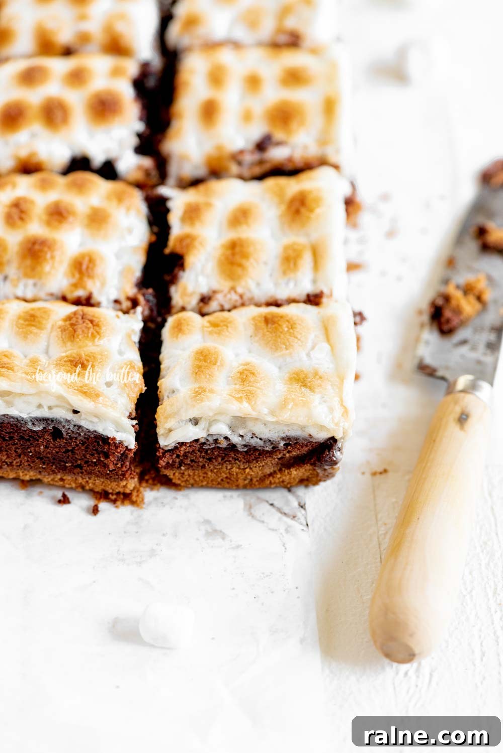 Layered S'mores Brownies Recipe: Gooey Graham, Chocolate & Marshmallow 6 Layered S'mores Brownies | All Images © Beyond the Butter, LLC