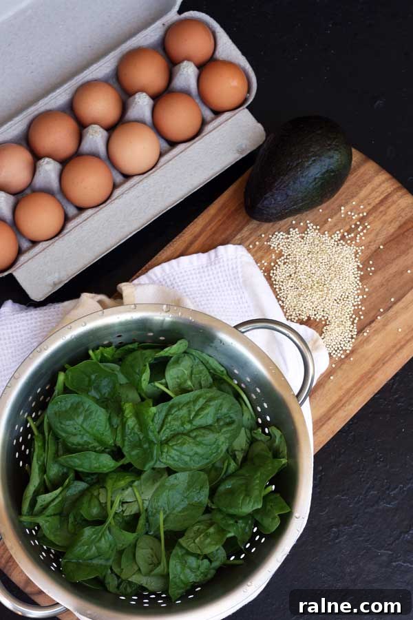 Poached Eggs with Avocado, Spinach and Crispy Quinoa Bowl 3 Ingredients for a breakfast of poached eggs with avocado, spinach & crispy quinoa