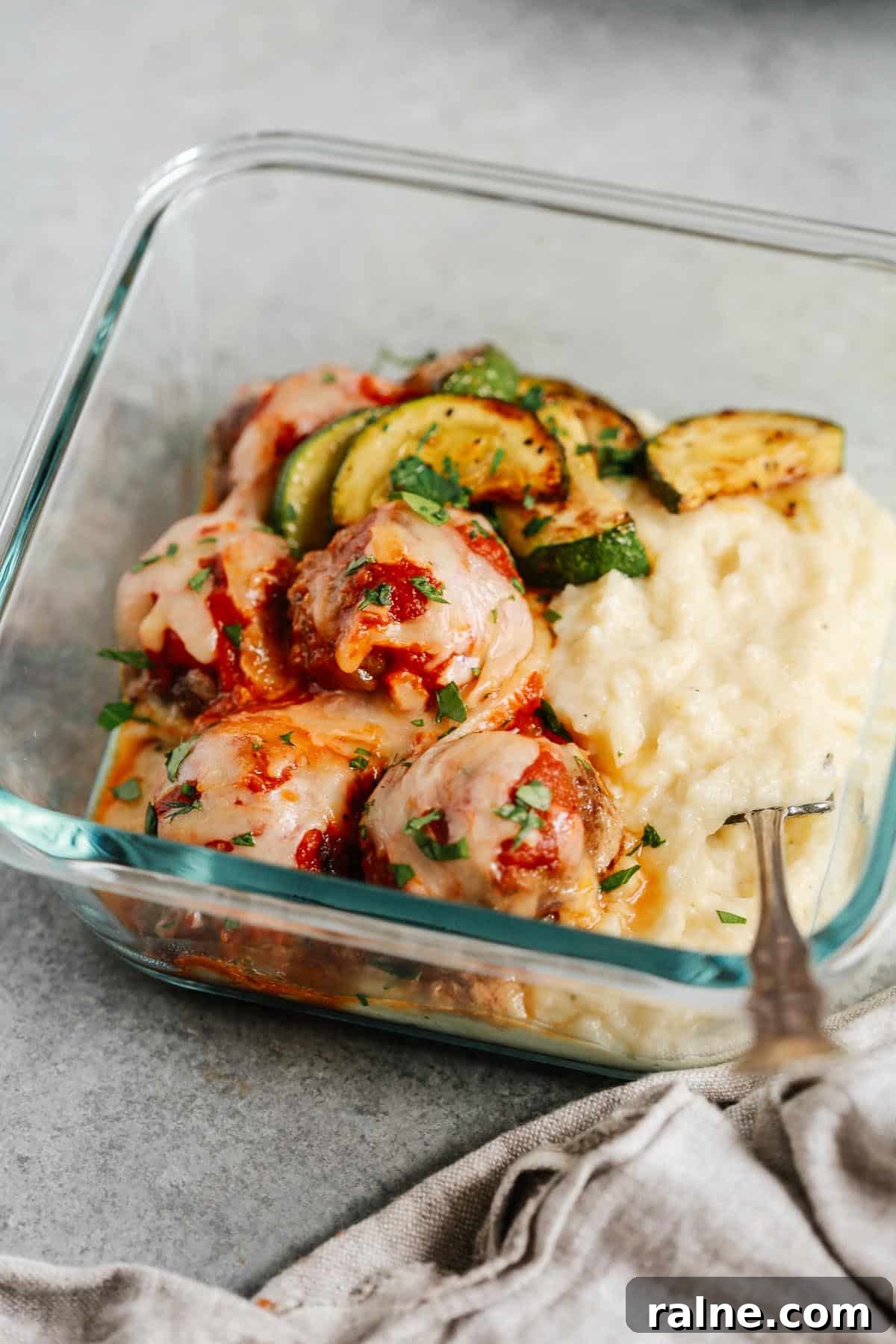 Cheesy Baked Meatball Casserole with Marinara and Pasta 5 close up of the meatball casserole in a meal prep container