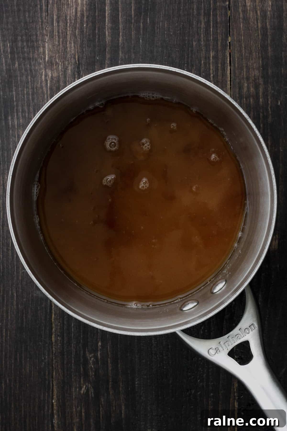 Brown Sugar Simple Syrup Recipe for Cocktails and Coffee 5 A small saucepan of brown sugar simple syrup cooking.