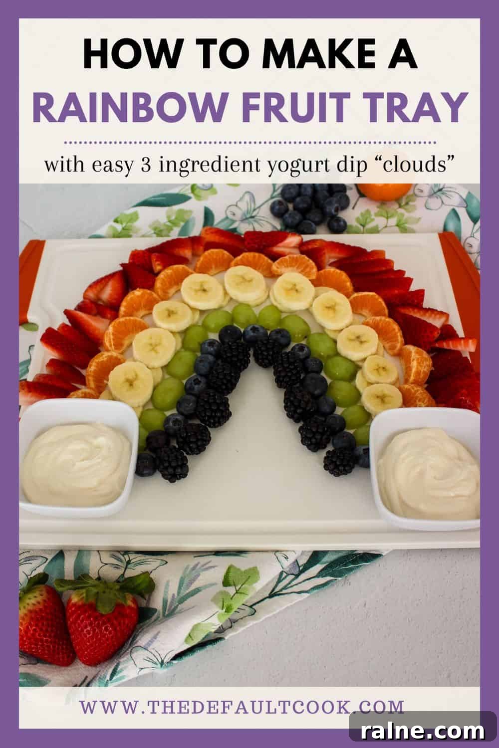 Colorful Fruit Platter with Creamy Yogurt Dip 8 A fruit platter arranged in a rainbow pattern on a white serving tray, with yogurt dips on either side, against a white tile background with a decorative napkin, and text above reading "how to make a rainbow fruit tray with easy 3 ingredient yogurt dip clouds" and the website name below.