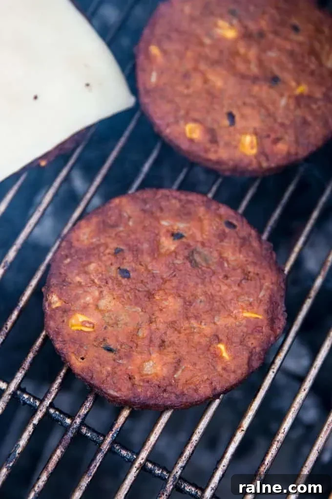 Black Bean Breakfast Burger with Avocado and Chipotle Mayo 5 black bean burgers on the grill