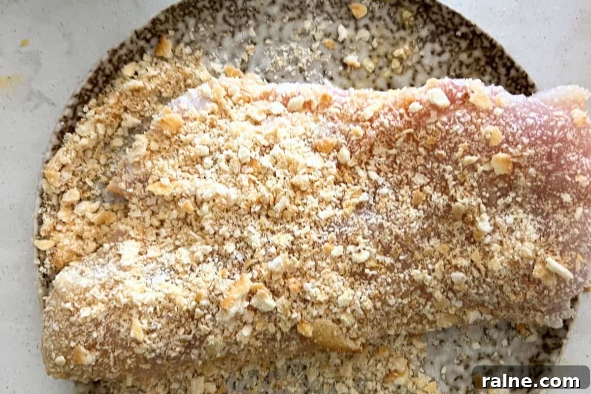 Crispy Air-Fryer Walleye Recipe for Golden, Flaky Fish 4 Walleye coated with bread crumbs and parmesan cheese.