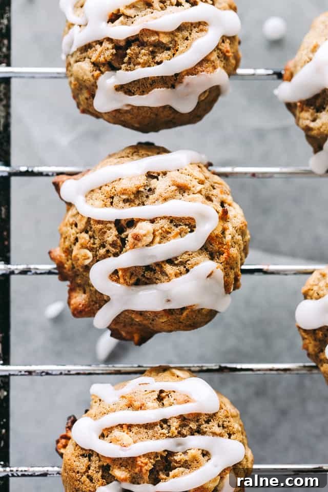 Oatmeal cookies topped with a drizzle of pineapple glaze.