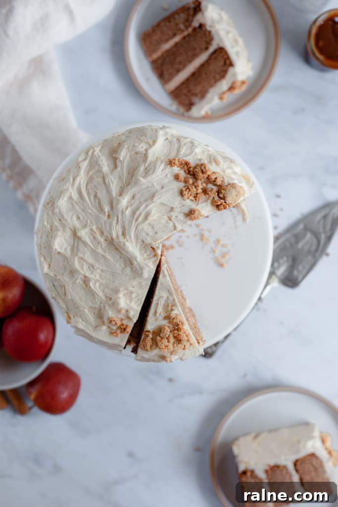 Apple Cider Layer Cake with Pie-Crumb Frosting and Salted Caramel Filling 6 top view of an apple cider cake, several slices on plates
