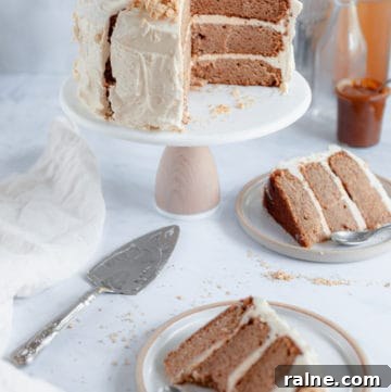 Apple Cider Layer Cake with Pie-Crumb Frosting and Salted Caramel Filling 7 apple layer cake on a stand, 2 slices on plates