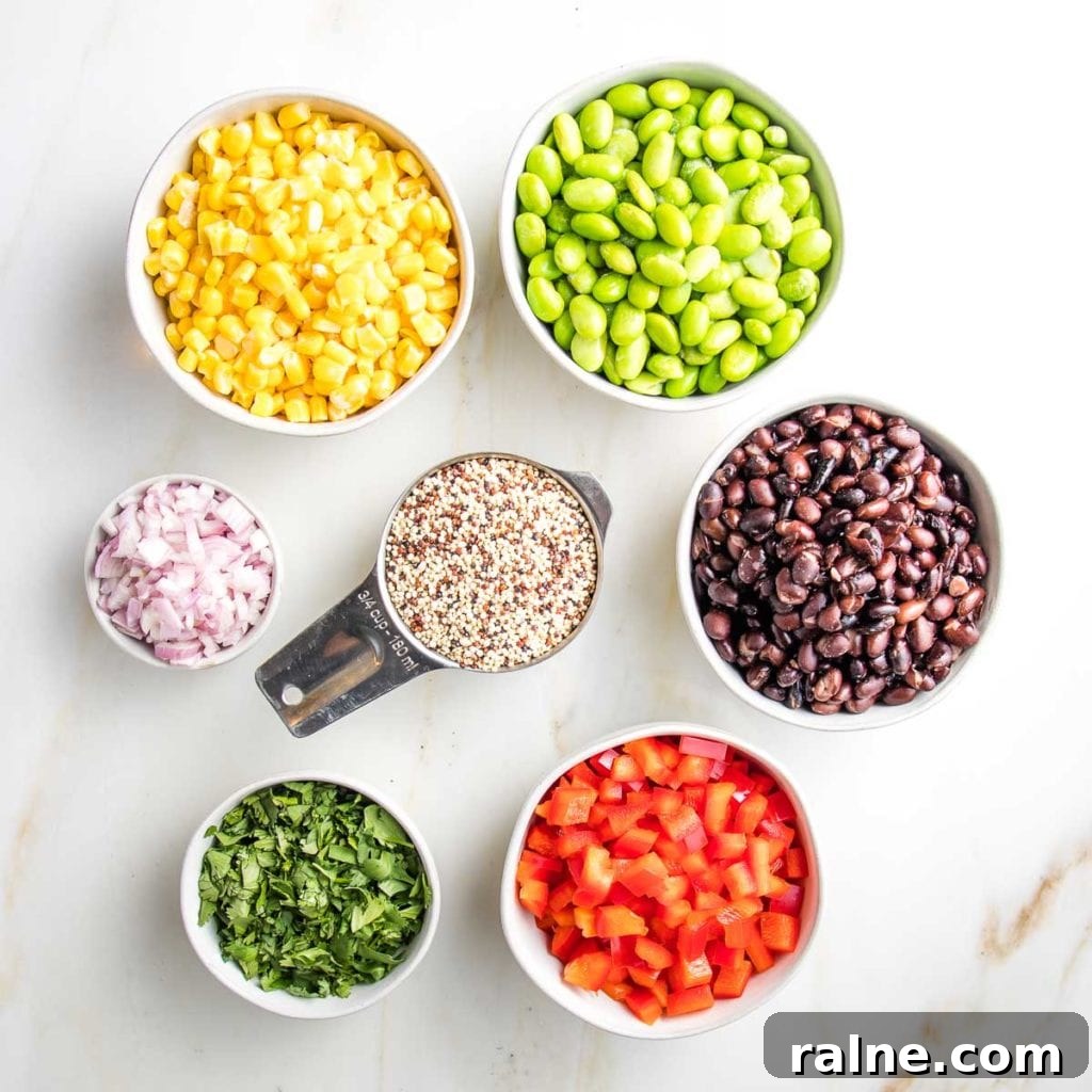 Southwest Quinoa Salad with Black Beans, Corn & Lime Dressing 4 small bowls with ingredients for quinoa salad: yellow corn, green edamame, black beans, minced shallot, chopped fresh cilantro, raw uncooked quinoa, black beans, diced red peppers