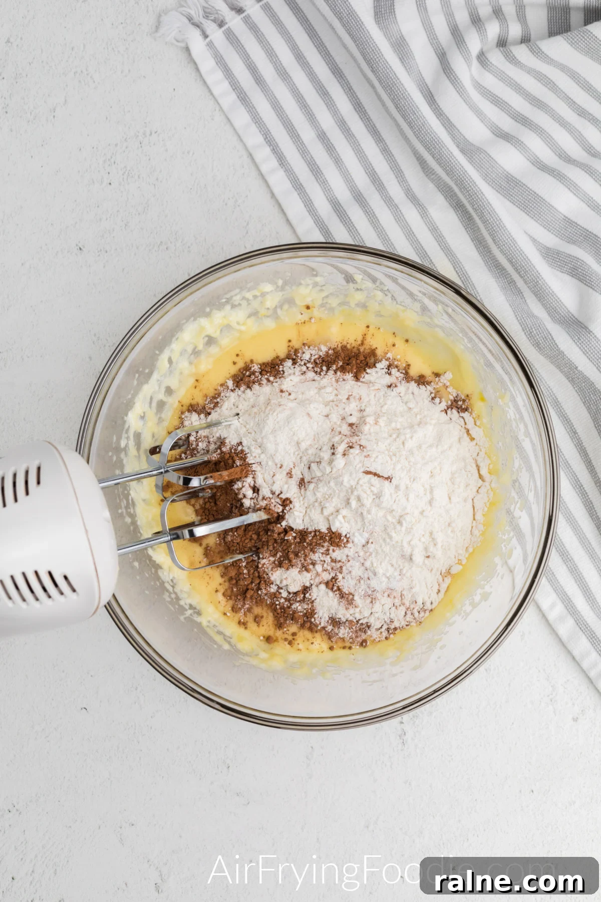 flour mixture added to sugar and butter mixture.