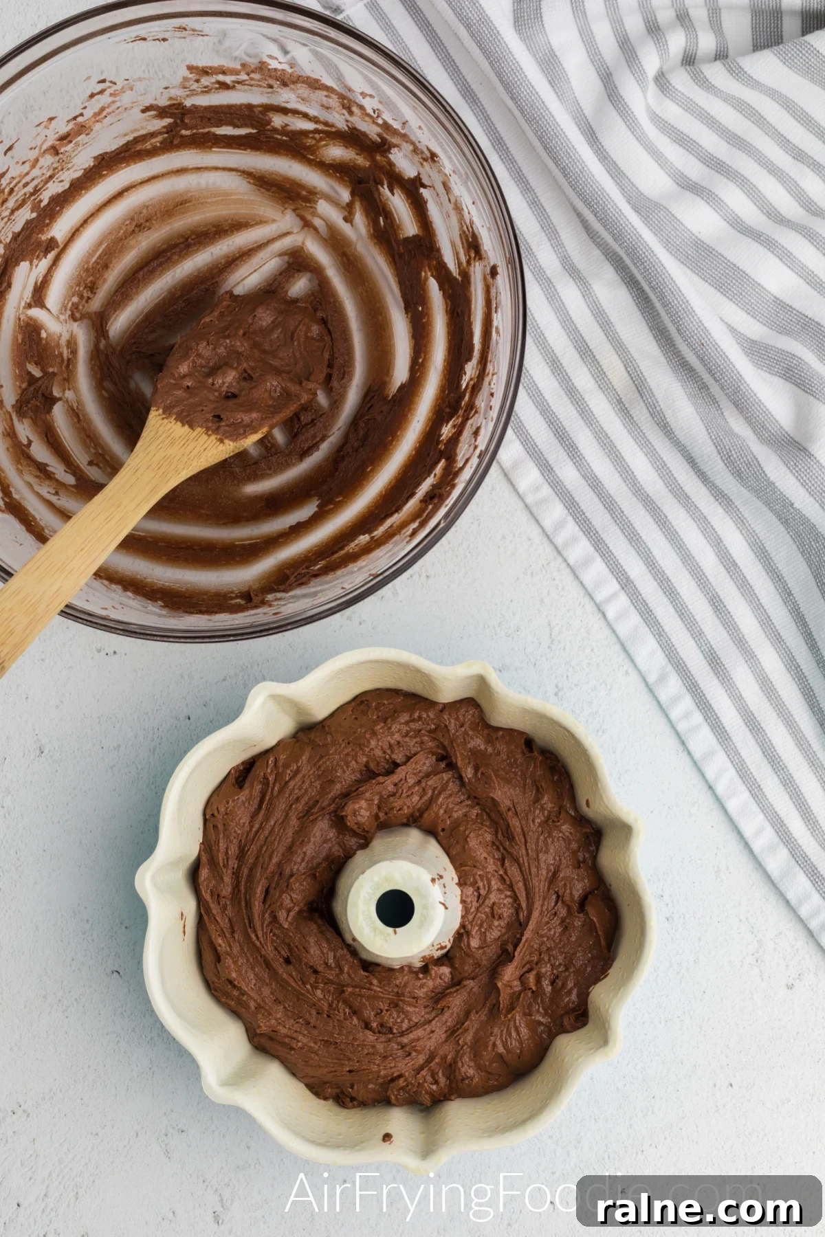 Chocolate cake batter added to the bundt pan.