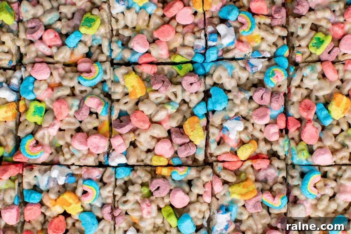 Lucky Charms marshmallow cereal bars cut into squares.
