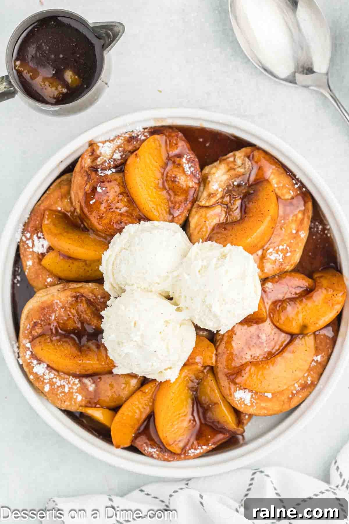 Crispy Fried Peach Cobbler: Southern Dessert Recipe 2 Deep fried peach cobbler topped with ice cream.