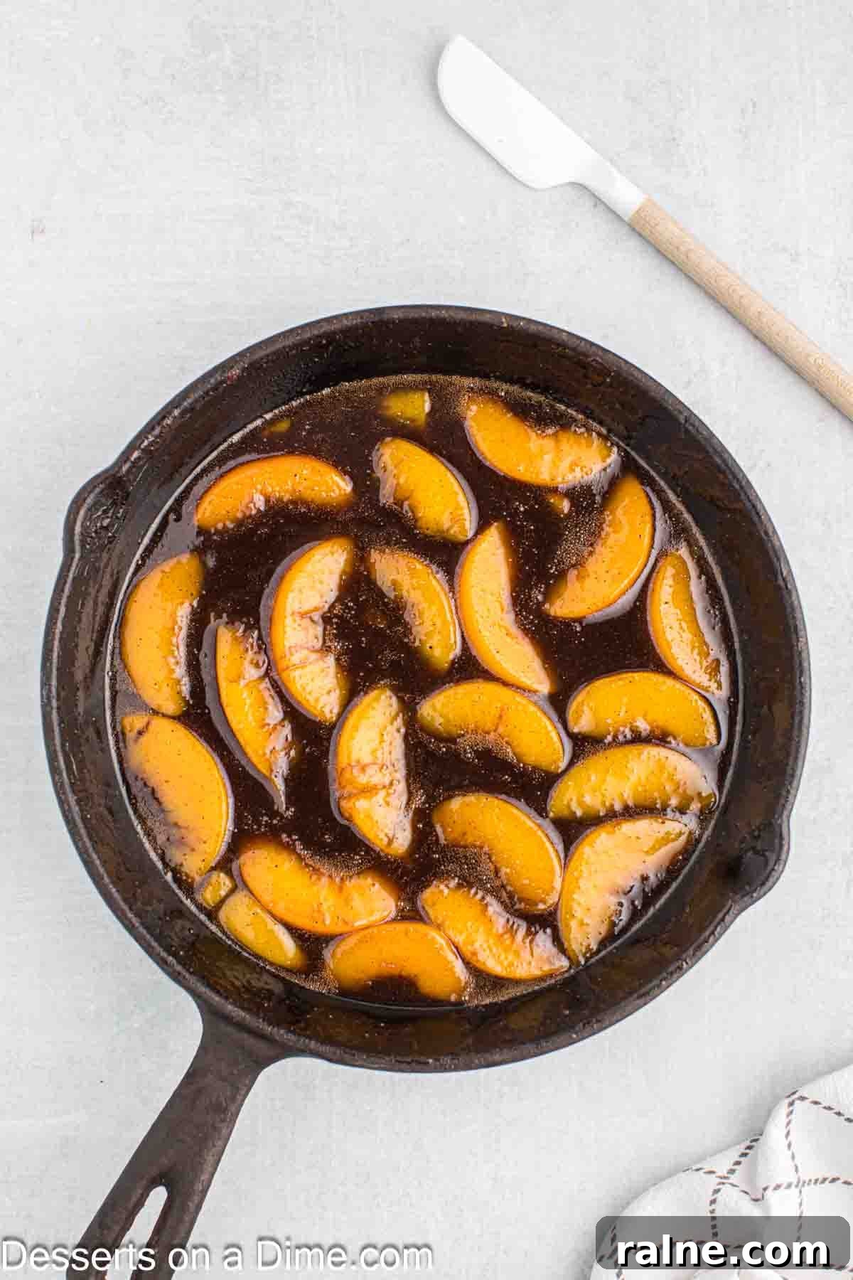 Crispy Fried Peach Cobbler: Southern Dessert Recipe 5 Peaches added to skillet.