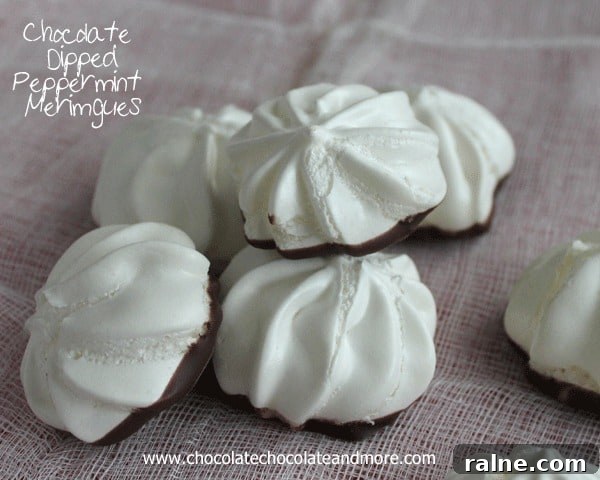 Chocolate Dipped Peppermint Meringues-the lightness of a Meringue with just the hint of peppermint complemented with a light dip in chocolate.