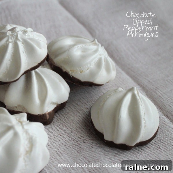Chocolate Dipped Peppermint Meringues-the lightness of a Meringue with just the hint of peppermint complemented with a light dip in chocolate.