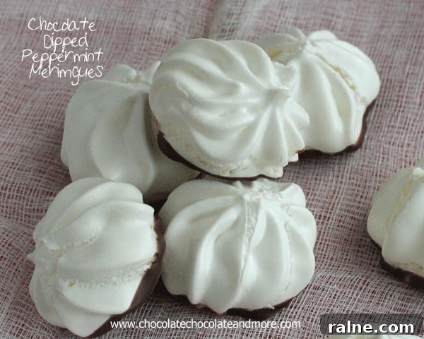 Chocolate Dipped Peppermint Meringues-the lightness of a Meringue with just the hint of peppermint complemented with a light dip in chocolate.
