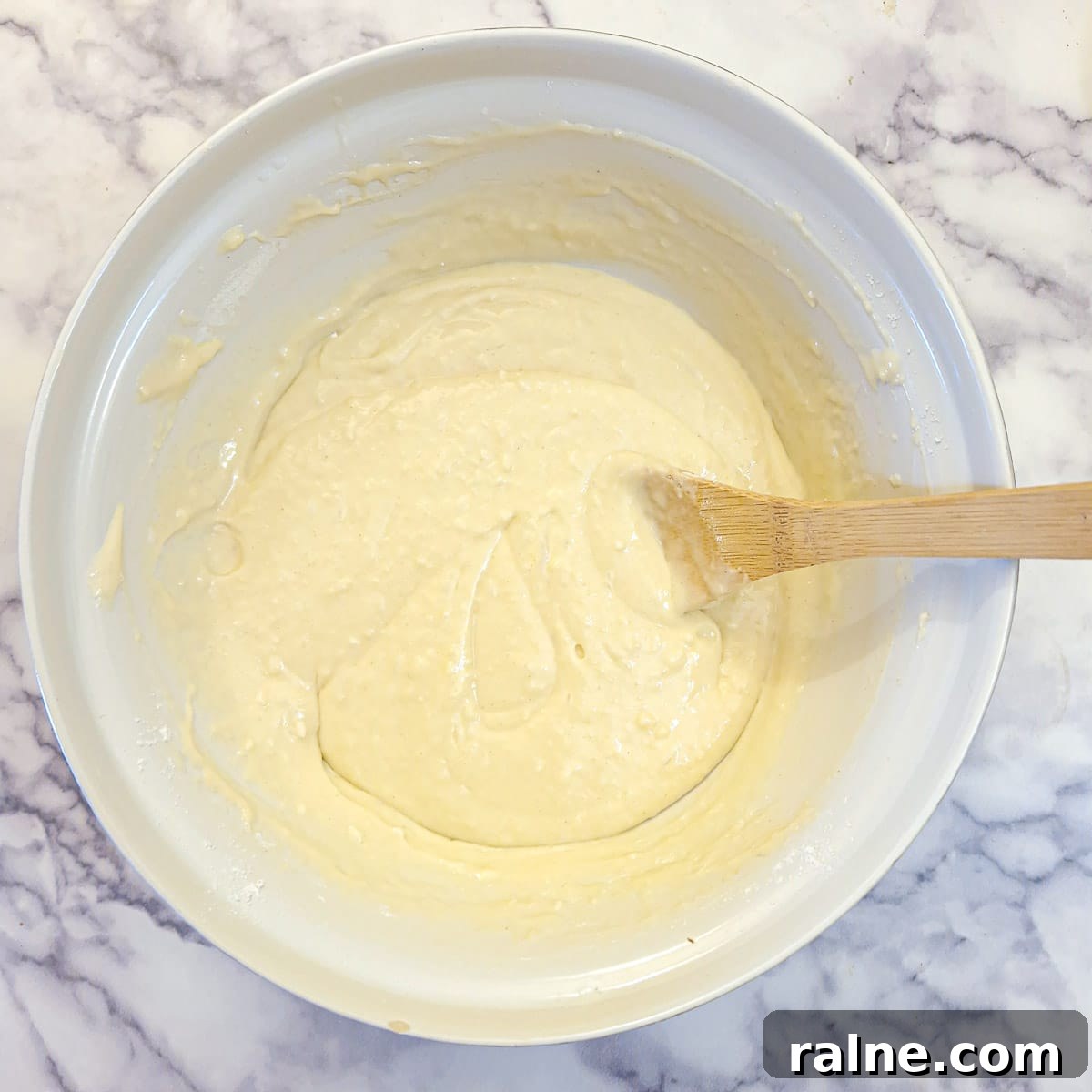 Light Mascarpone Strawberry Cake Without Butter — Moist Summer Dessert 7 The batter for a strawberry mascarpone cake after the flour has been folded in.