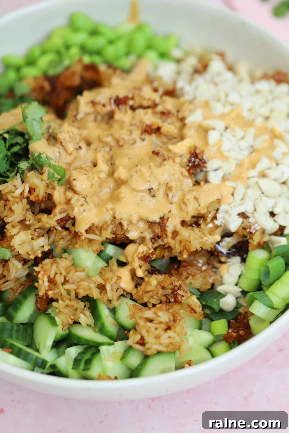 Crispy Rice Salad with Crunchy Veggies and Tangy Dressing 4 Close up of a crispy rice salad before being mixed together.
