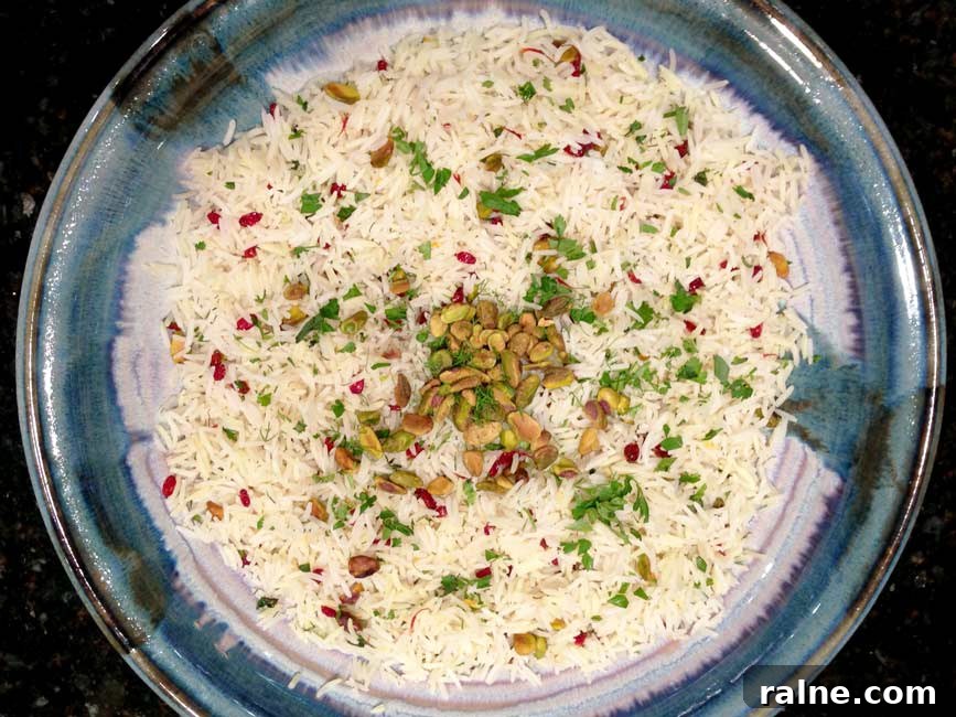 Barberries (Zereshk): A Culinary Guide to Persia’s Tangy Jewel 6 herb and barberry rice in large blue bowl