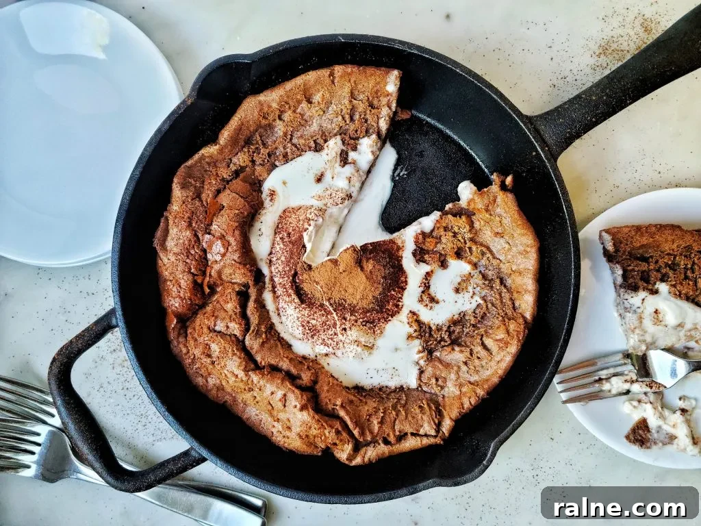 chocolate dutch baby pancake with homemade whipped cream