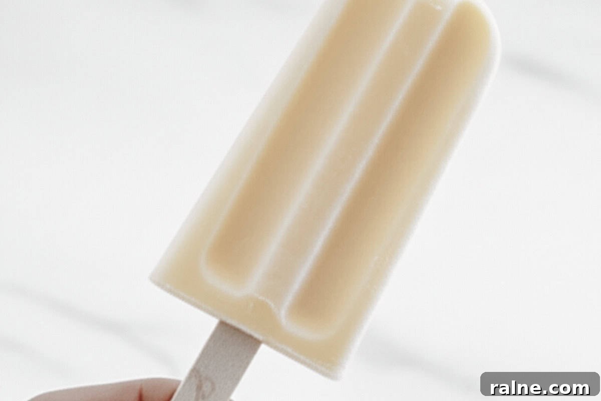 Creamy Banana Popsicle Recipe: 4-Ingredient Frozen Treat 8 Gently pull out the popsicles from the molds
