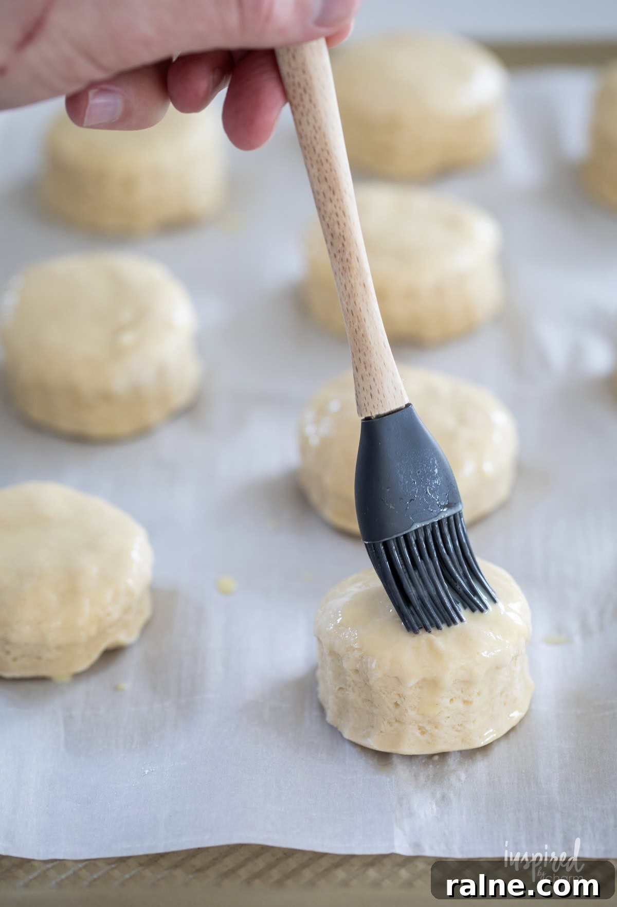 pastry brush adding eggs wash to scones.