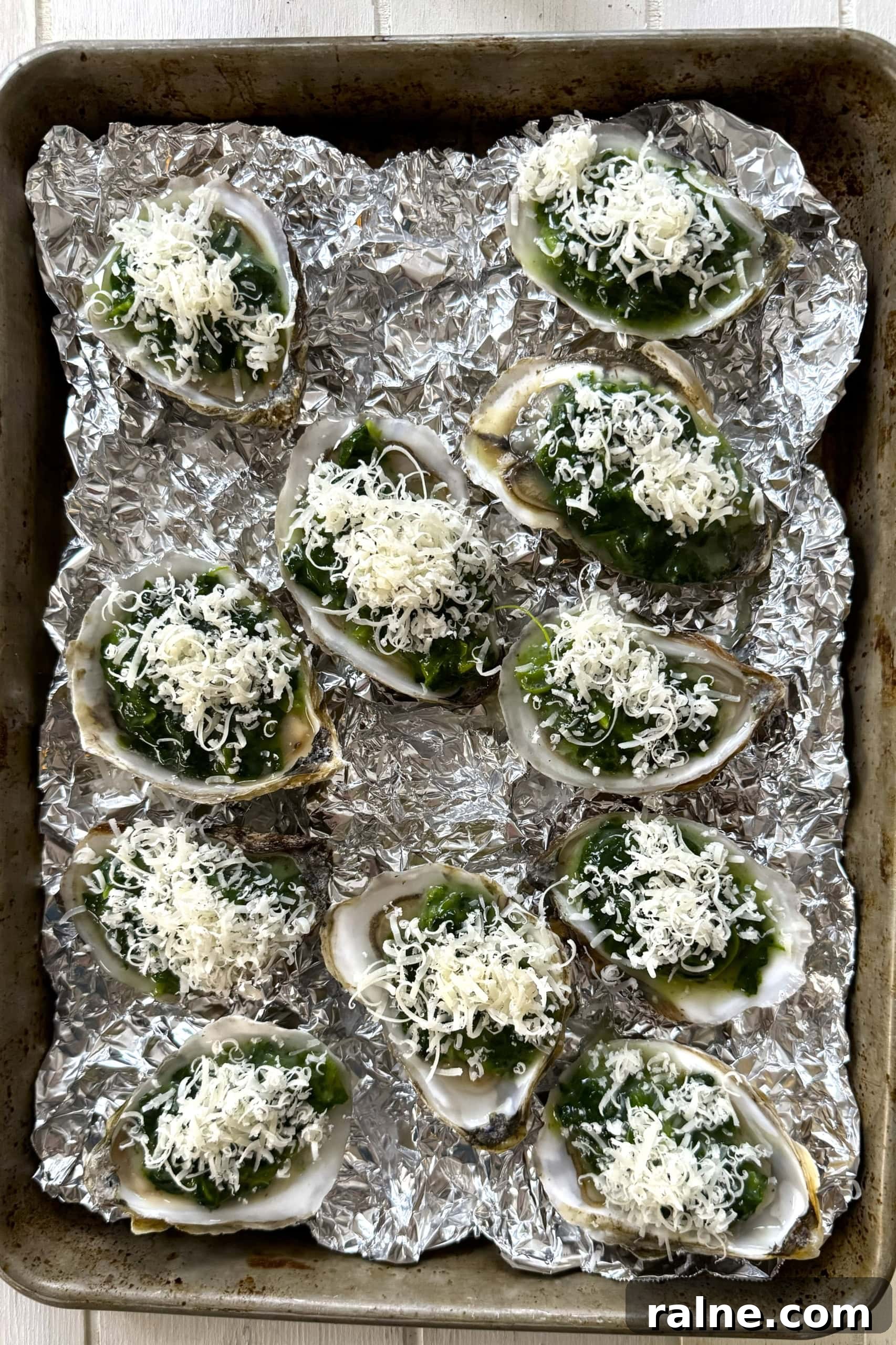 Oysters Rockefeller with Frozen Creamed Spinach: Quick Recipe 9 Unbaked oysters Rockefeller topped with parmesan cheese and panko.