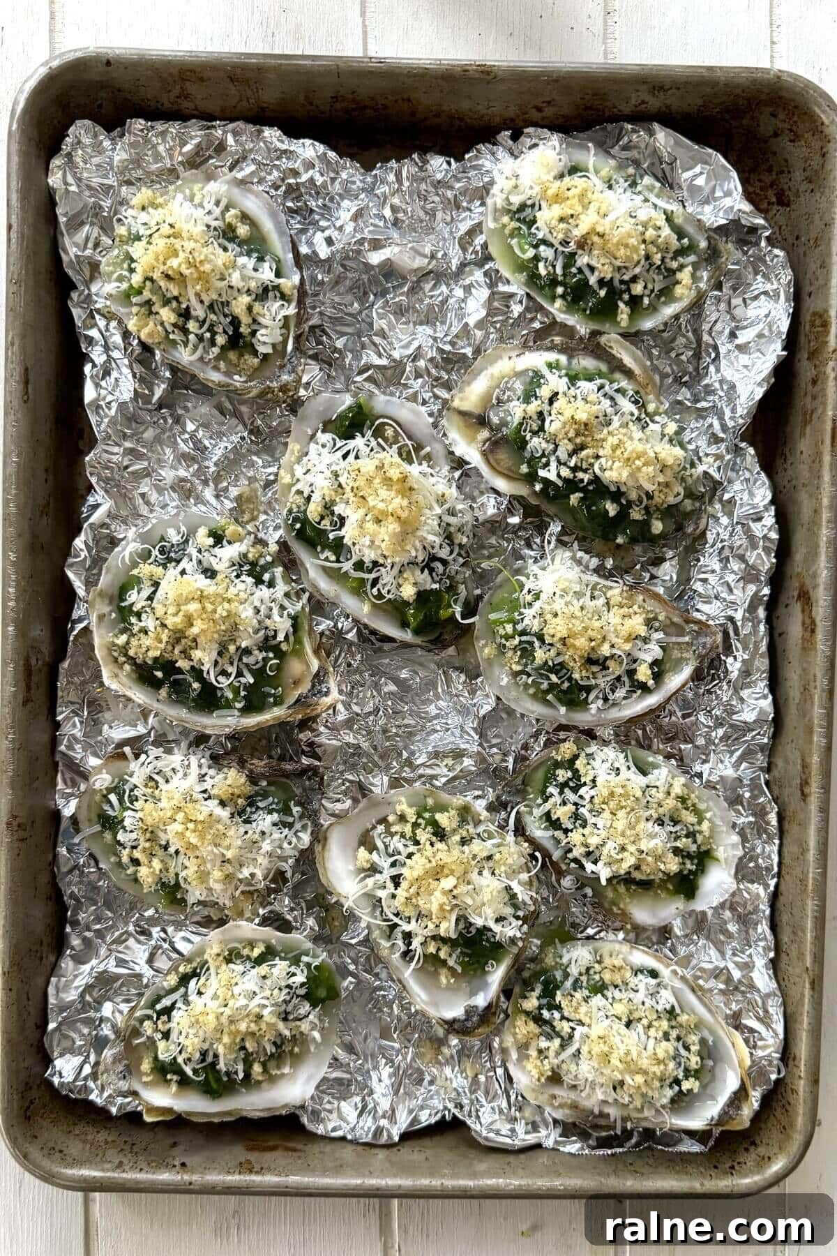 Oysters Rockefeller with Frozen Creamed Spinach: Quick Recipe 10 Baked oysters Rockefeller on crumpled foil.