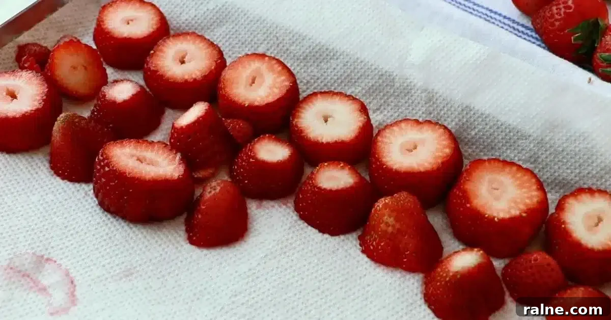 Decadent Strawberry Cream Layer Cake Recipe 15 fresh strawberries on a kitchen paper to remove the excess moisture