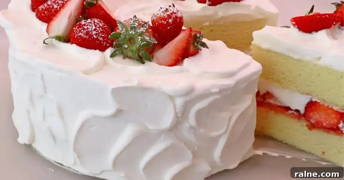 Decadent Strawberry Cream Layer Cake Recipe 26 sliced strawberry cream cake