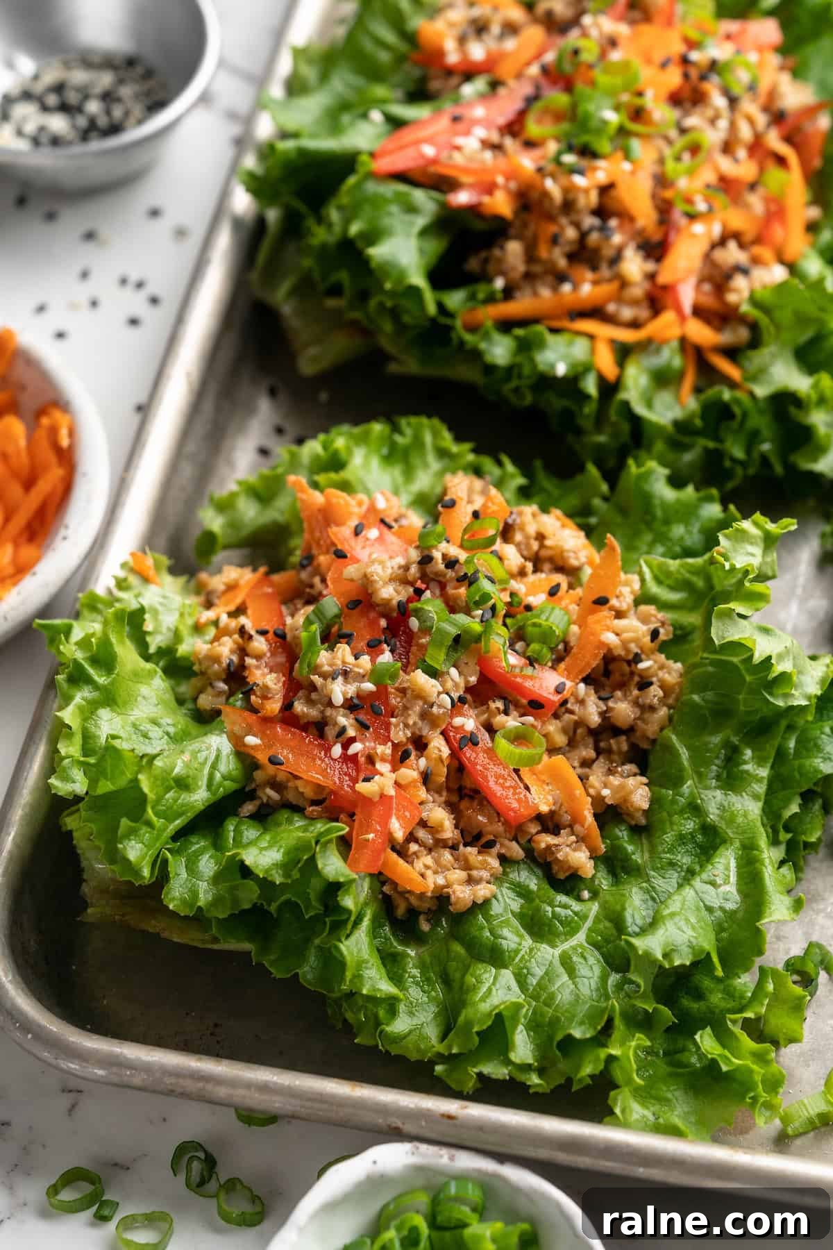 Whether you’re looking for a no-cook dinner or something light and refreshing, you’re going to love these easy Asian-inspired lettuce wraps! Lettuce wraps on sheet pan